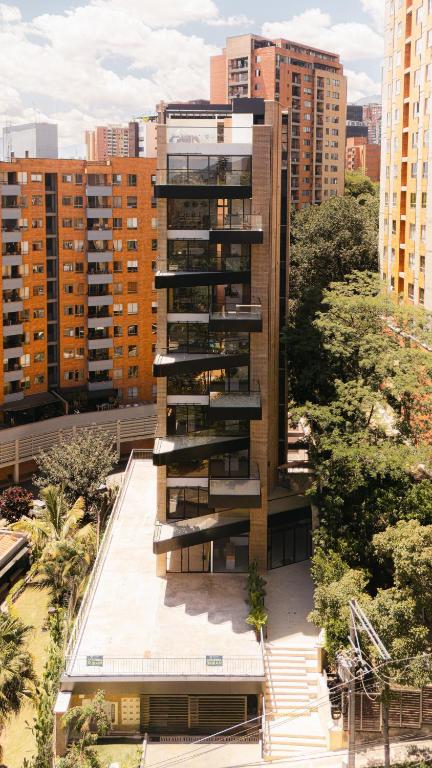 an aerial view of a building in a city at Altitud Medellín Viem Living in Medellín