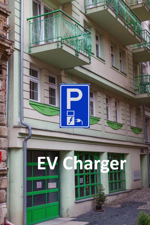 a parking sign on the side of a building at Apartment Lilianna in Karlovy Vary