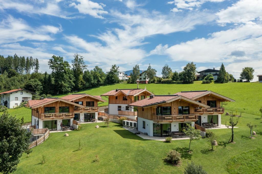an aerial view of a house on a hill at Chalets Mariasteinerhof in Mariastein