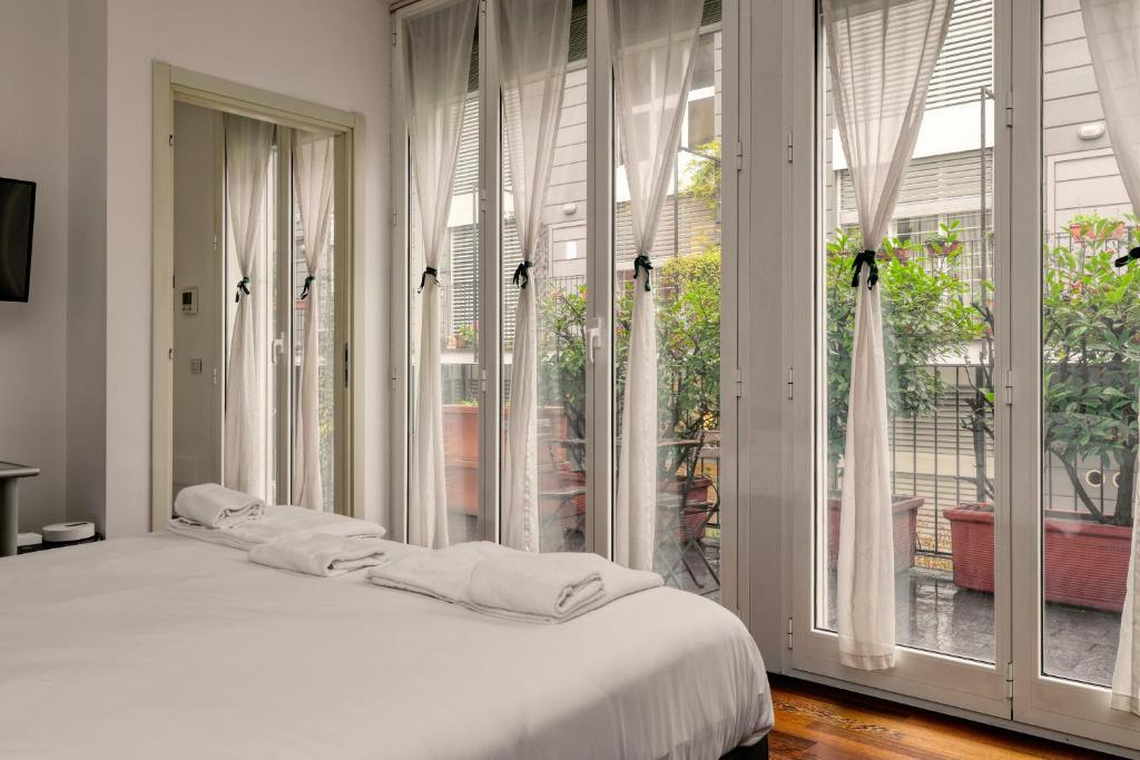 The Cozy Terrace Suite - Isola District