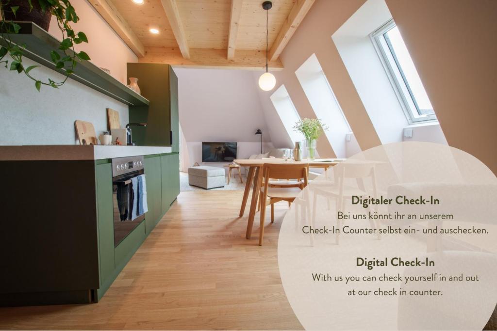 a kitchen with a table with a sign that says digital checklist at stuub titisee in Titisee-Neustadt