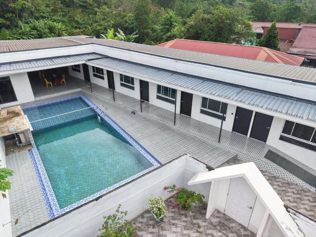 an overhead view of a swimming pool on a building at Chalet Gunung Stong in Dabung