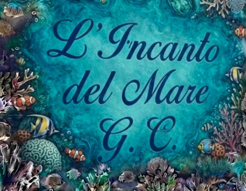 a cake with the words i meanio del mare and ocean at L'Incanto del mare GC in Saline Joniche