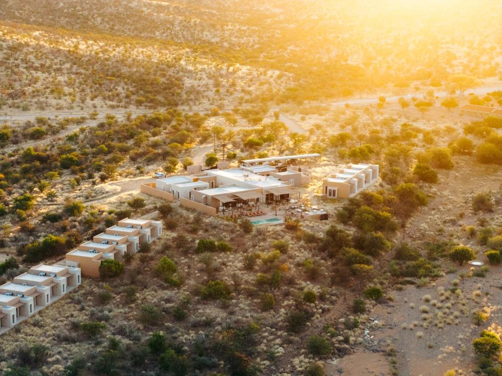an aerial view of a building in the desert at Lodge Damaraland in Khorixas