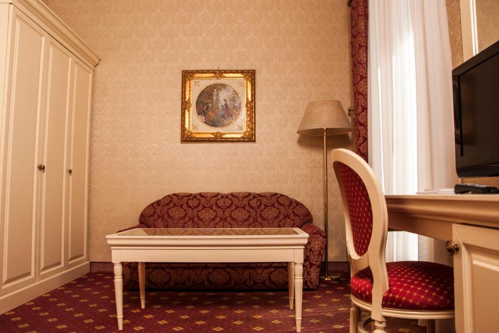 TV a/nebo společenská místnost v ubytování Hotel Terme Roma