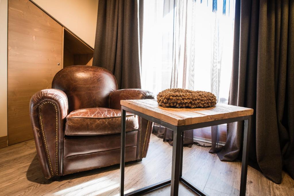 Posedenie v ubytovaní Hotel Alù Mountain Design