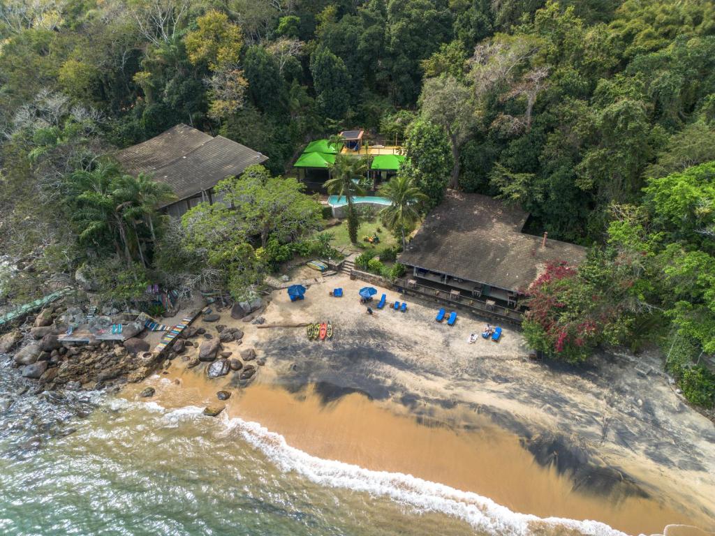 an aerial view of a beach with a resort at Paraíso Azul Retiro in Abraão