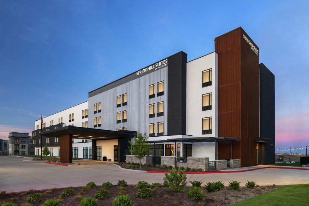 a rendering of a hotel with a building at SpringHill Suites by Marriott Abilene in Abilene