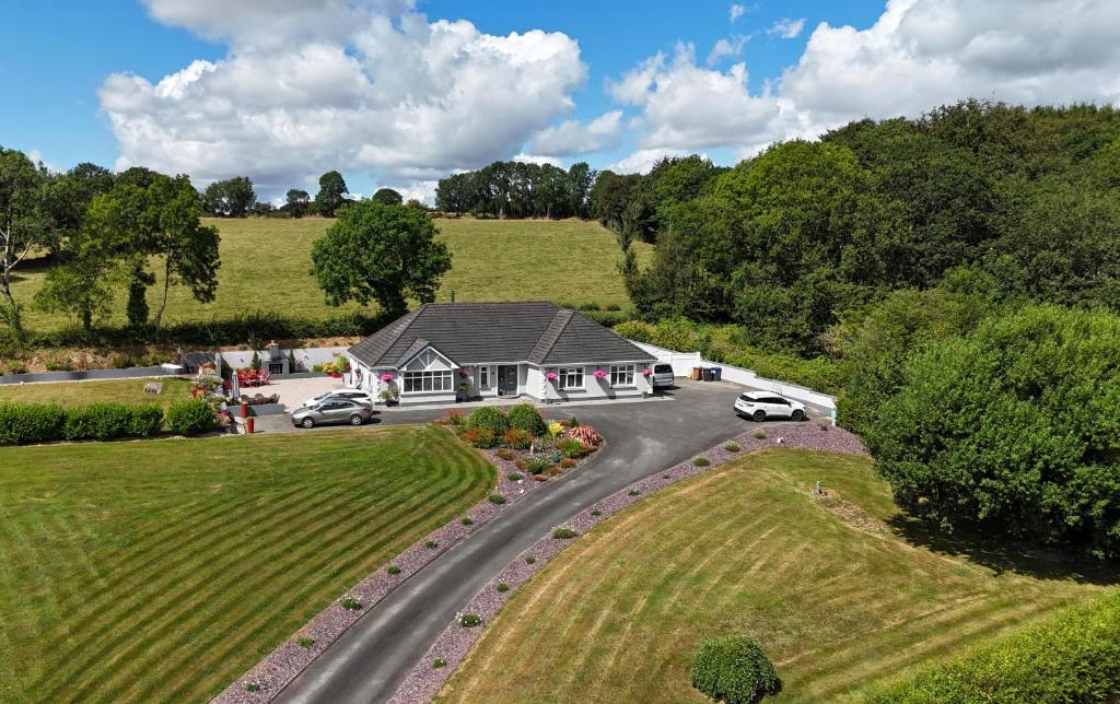 an aerial view of a house on a road at Grangebeg B&B Dunlavin W91FK50 in Dún Luáin