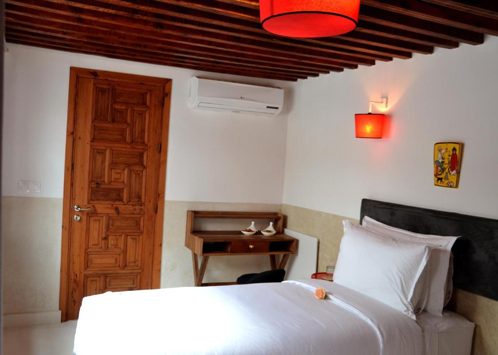 Postel nebo postele na pokoji v ubytování Riad Dar Dar
