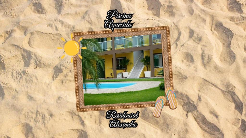 a picture of a mirror in the sand at Residencial Alexandre - Com piscina aquecida in Matinhos
