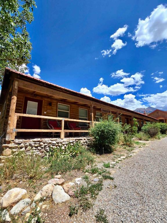 a log cabin on the side of a road at Pack Creek ~ Creekside West in Moab