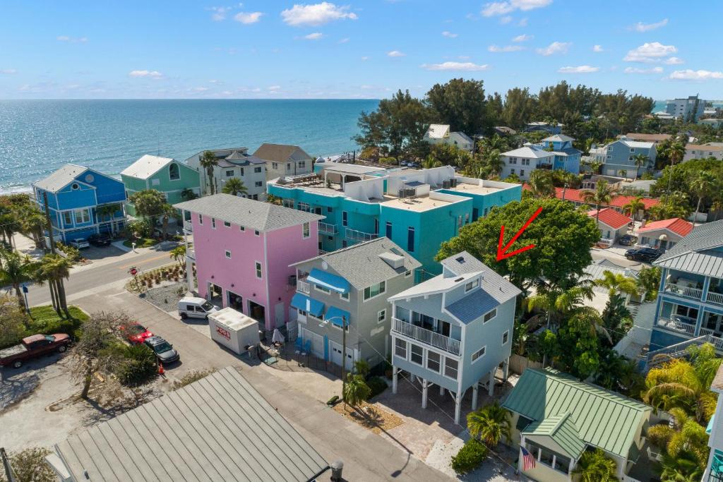 an aerial view of a town next to the ocean at Sunset Beach House in Pittman Center
