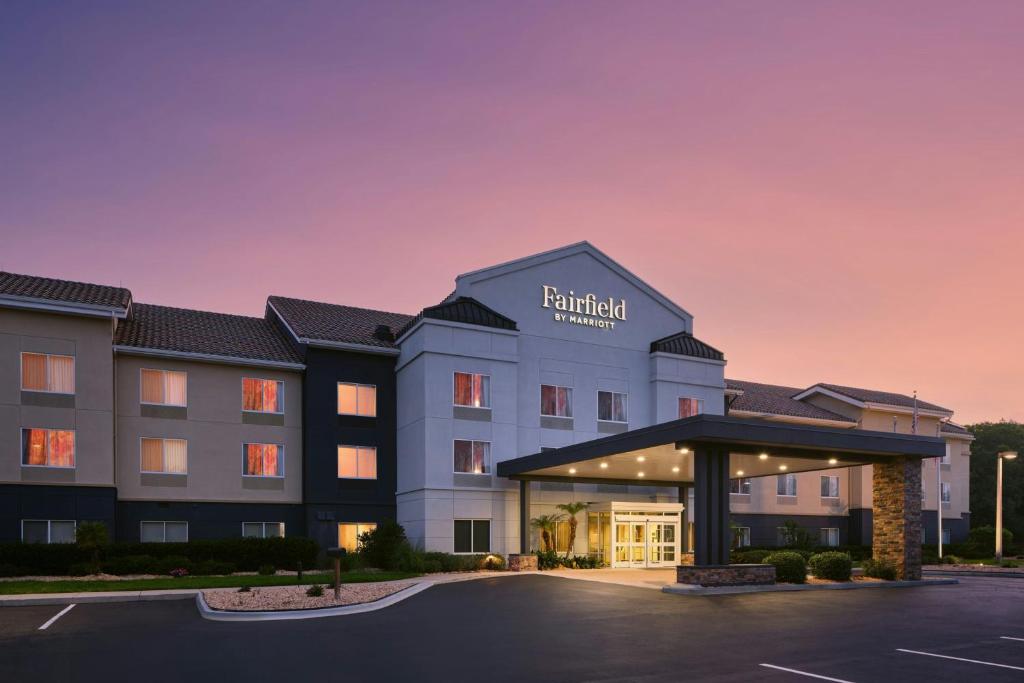 a rendering of the exterior of a hotel with a parking lot at Fairfield Inn and Suites by Marriott Saint Augustine I-95 in St. Augustine