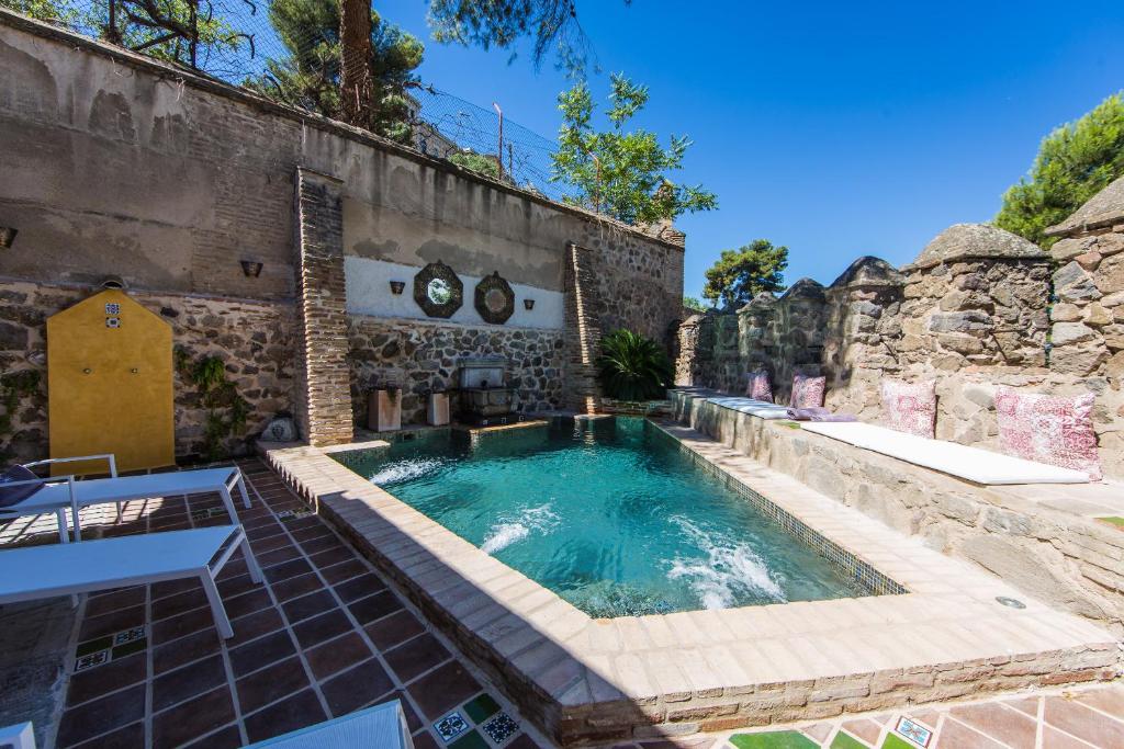 Bazén v ubytování Hotel Hacienda del Cardenal nebo v jeho okolí