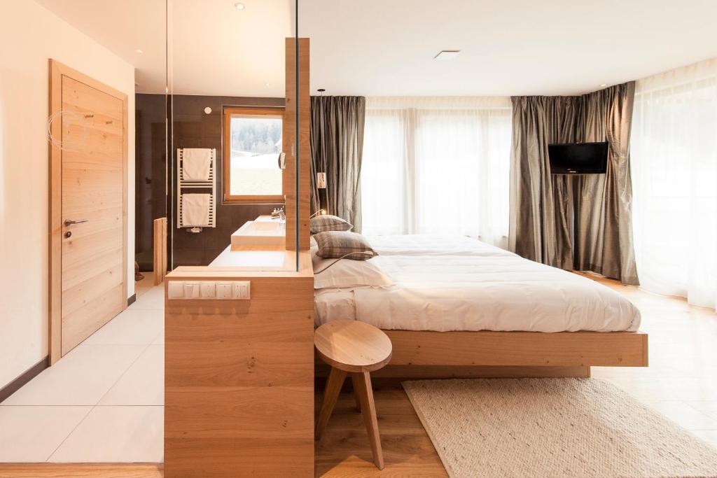 Postel nebo postele na pokoji v ubytování Hotel Petrus