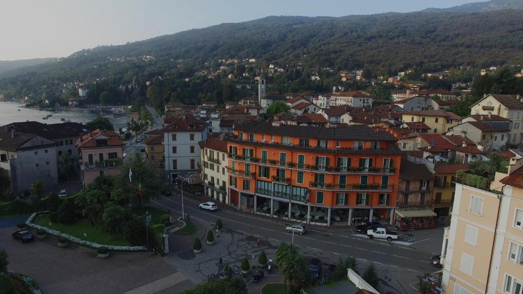an aerial view of a town with a river and buildings at Hotel Residence Dei Fiori in Baveno