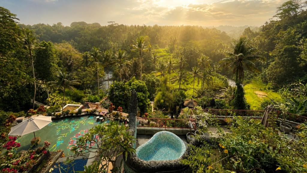 an aerial view of a pool at a resort at River Song Ubud, Bali in Ubud