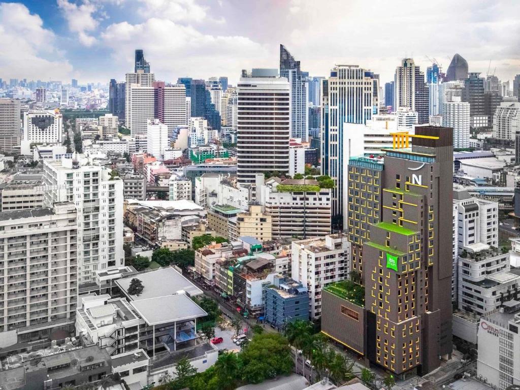 an aerial view of a city with tall buildings at ibis Styles Bangkok Sukhumvit 4 in Bangkok