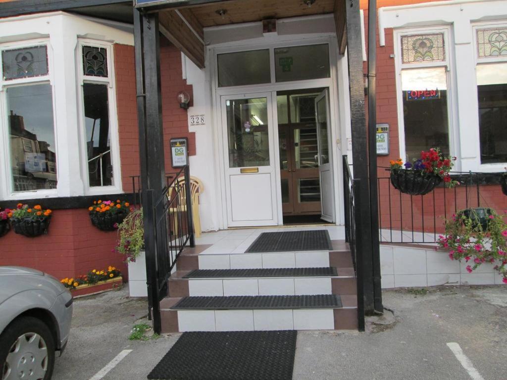 a front door of a house with a porch at Paramount Hotel in Nottingham