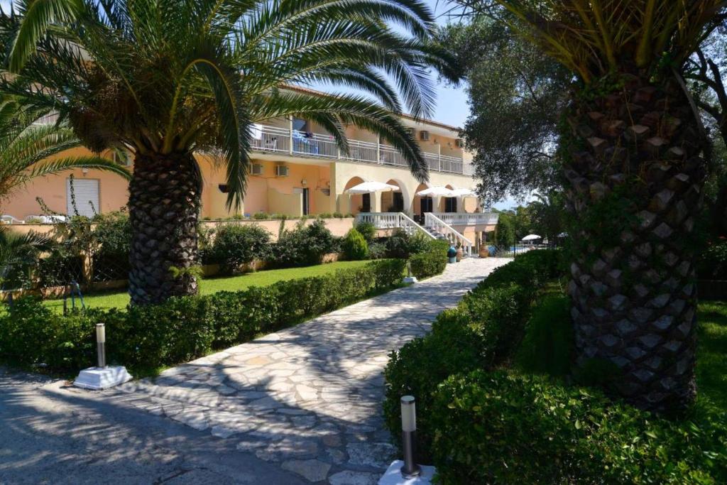 A garden outside Primavera Hotel