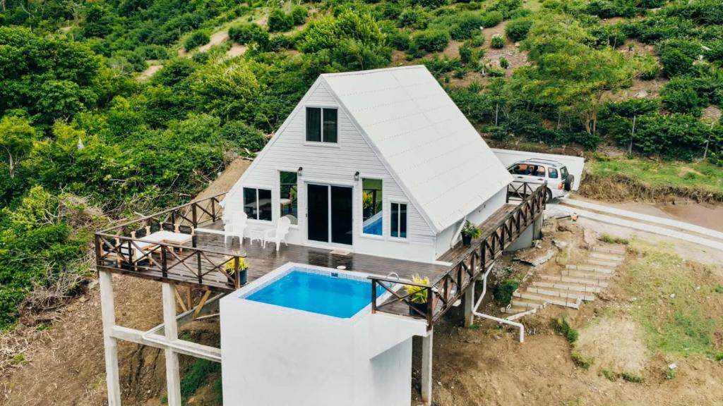 an aerial view of a house with a swimming pool at Dover View Villas in Carriacou