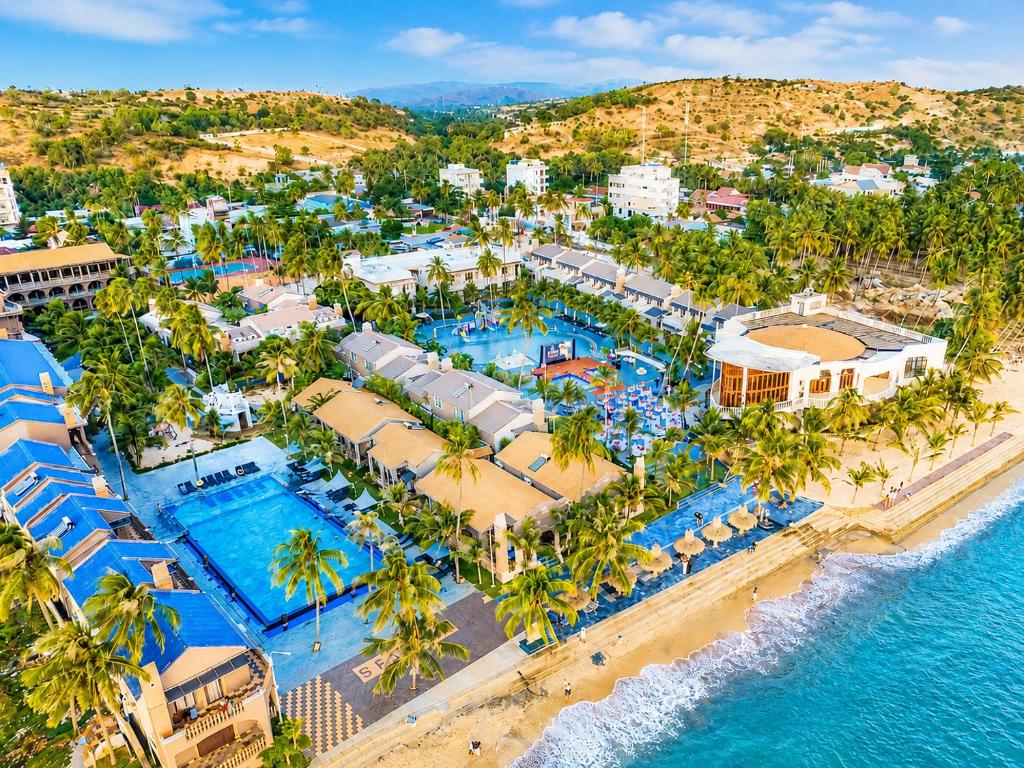 an aerial view of the resort and the ocean at Le' VIVA Resort Mui Ne in Mui Ne