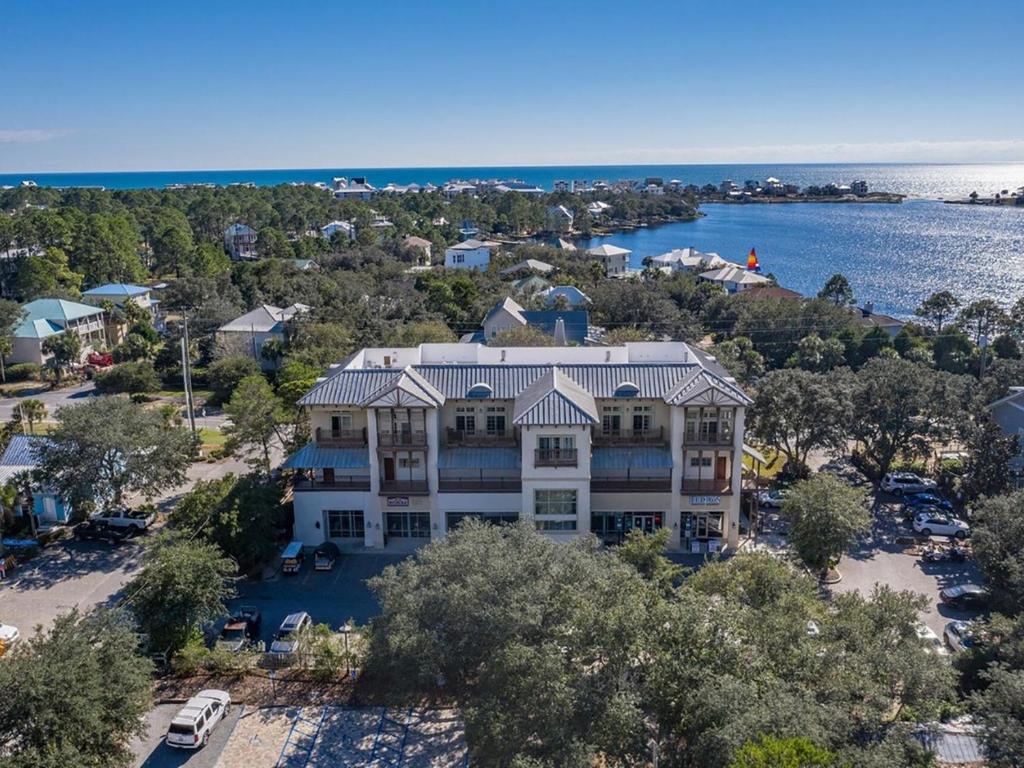 an aerial view of a large house with a parking lot at Eastern Lake Village #E - Just 4 Fun in Seagrove Beach