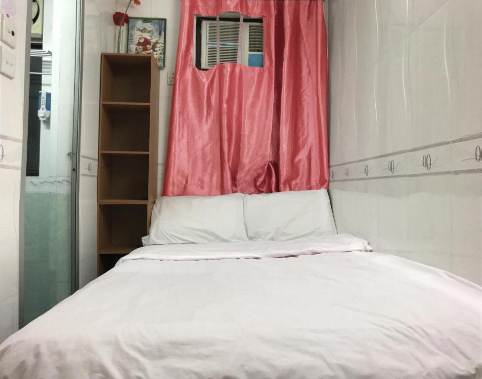 Postel nebo postele na pokoji v ubytování Beverly Guest House