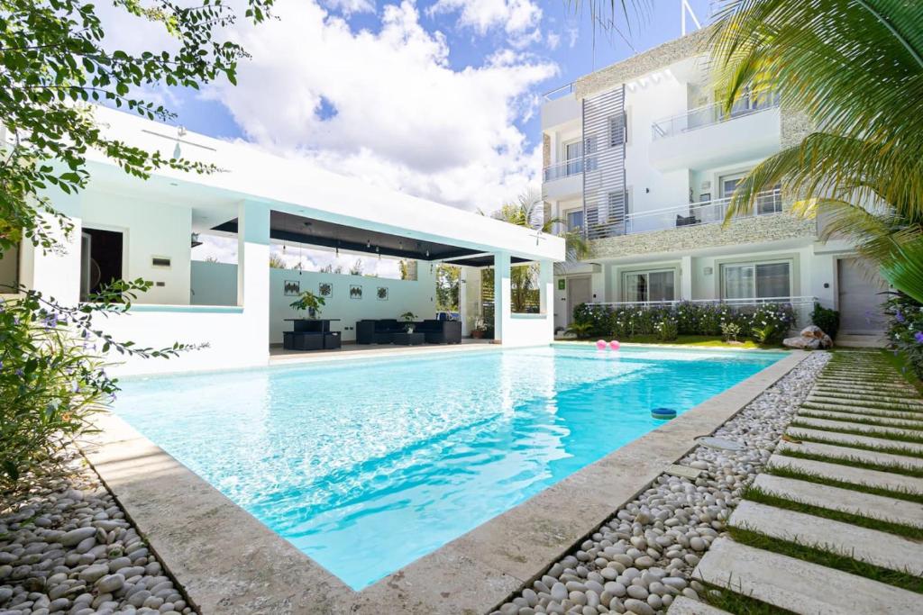a swimming pool in the backyard of a house at Elegant 2 Bedroom Apartment with Pool in La Laguna