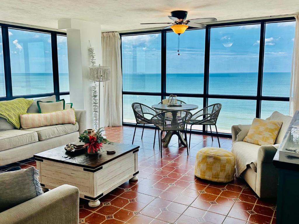 a living room with a view of the ocean at Daytona oceanfront two-bedroom suite in Daytona Beach