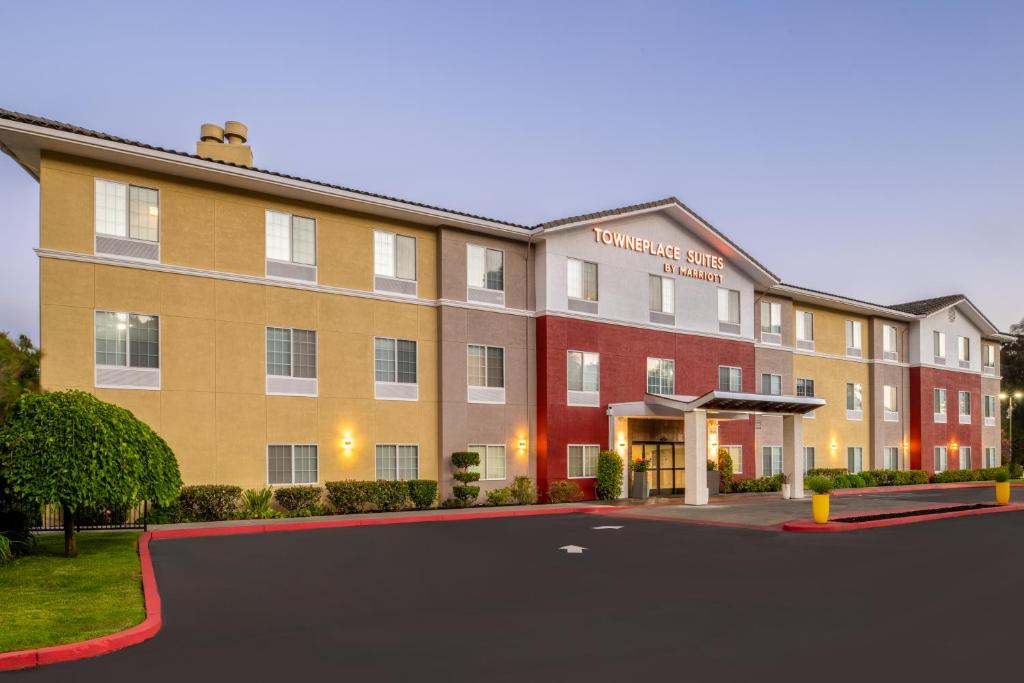 a hotel with a parking lot in front of it at TownePlace Suites by Marriott San Pablo in San Pablo