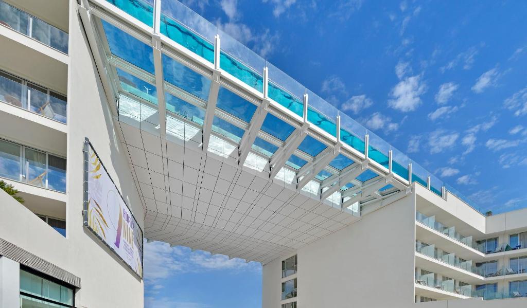 a balcony on the side of a building at INNSiDE by Meliá Calviá Beach in Magaluf