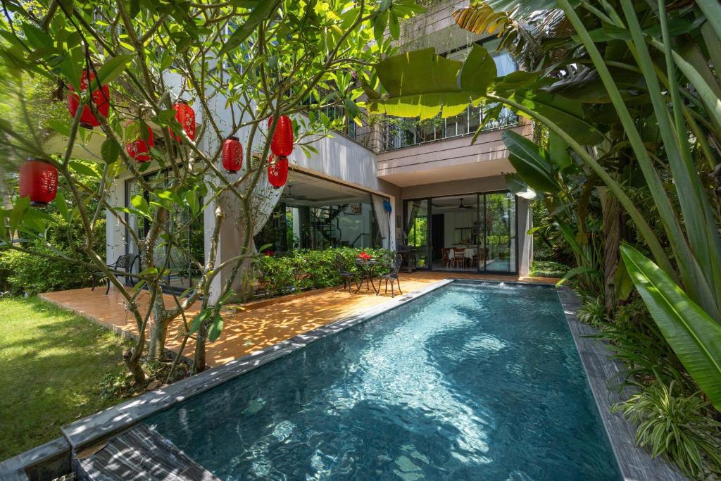 a swimming pool in the backyard of a house at Luxury Mountain View 3BR Villa Pool 10ppl in Phúc Yên