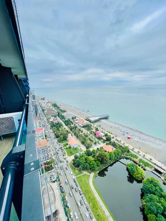 an aerial view of a city and a beach at Batumi High View in Batumi