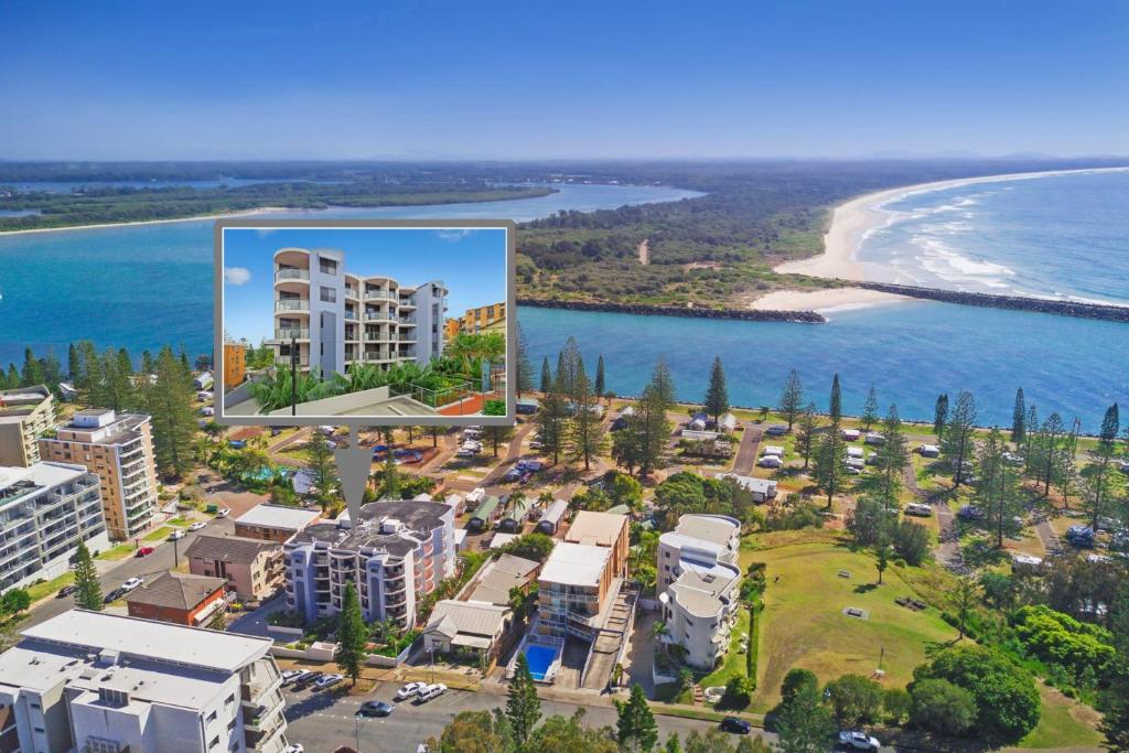 an aerial view of a resort next to a beach at Flightdeck 101, Clarence Street in Port Macquarie