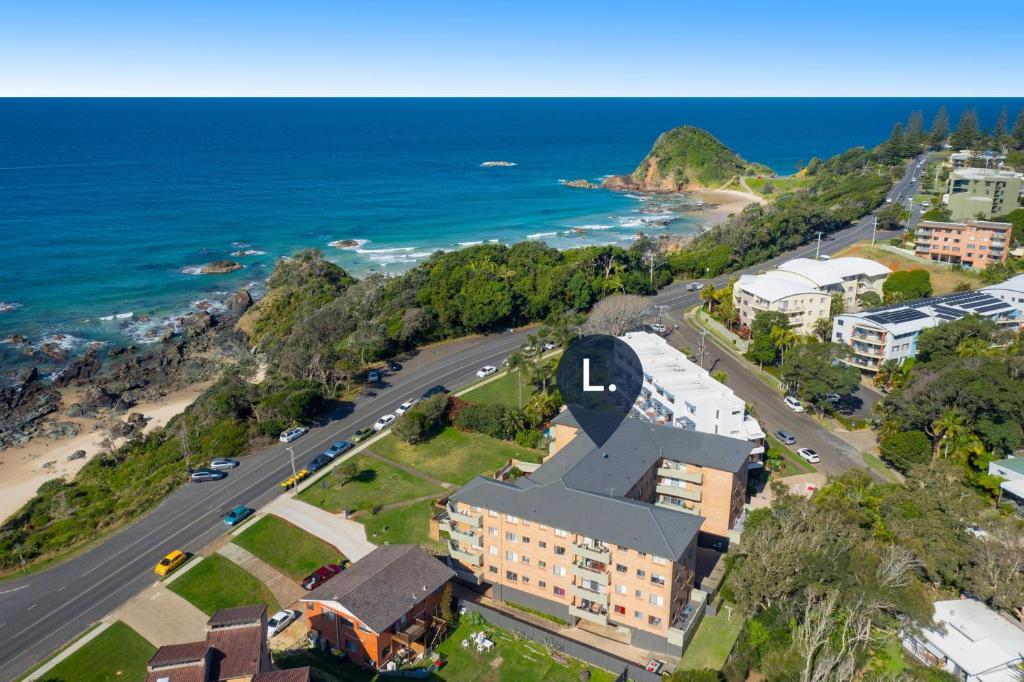 an aerial view of a building next to the ocean at Relax at Flynn s View in Port Macquarie