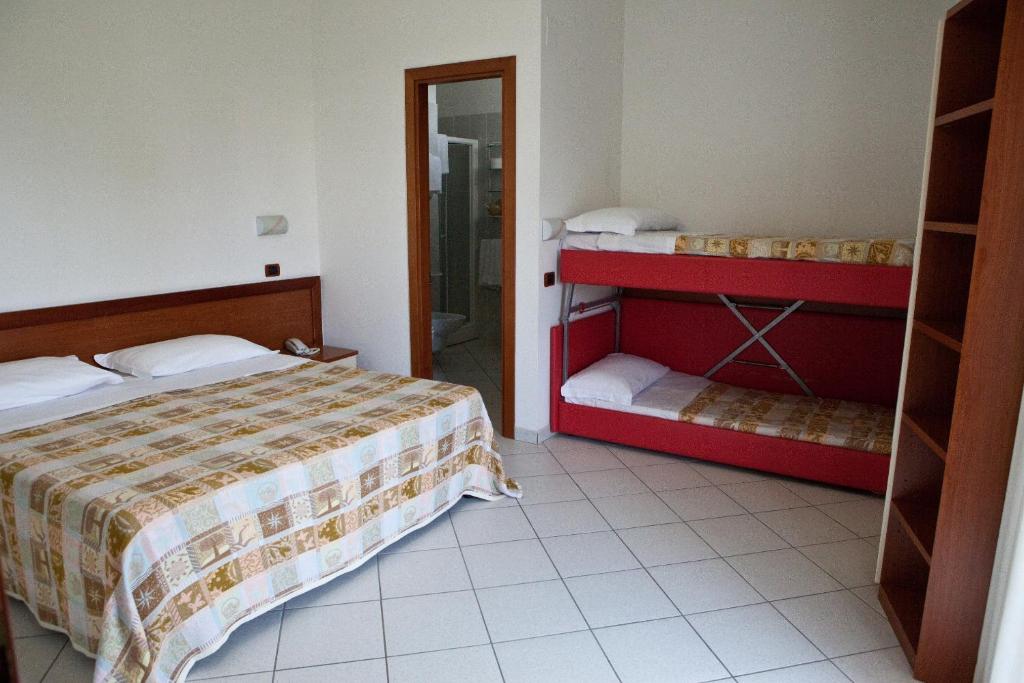 Postel nebo postele na pokoji v ubytování Hotel Clipper