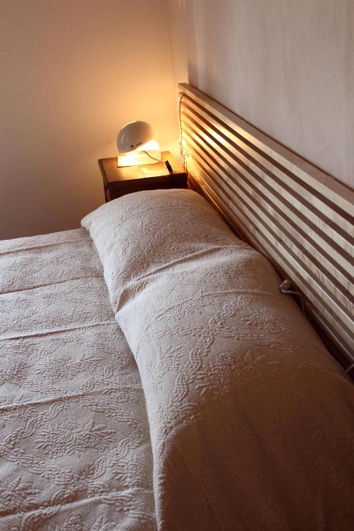 Postel nebo postele na pokoji v ubytování Caspineda Agriturismo