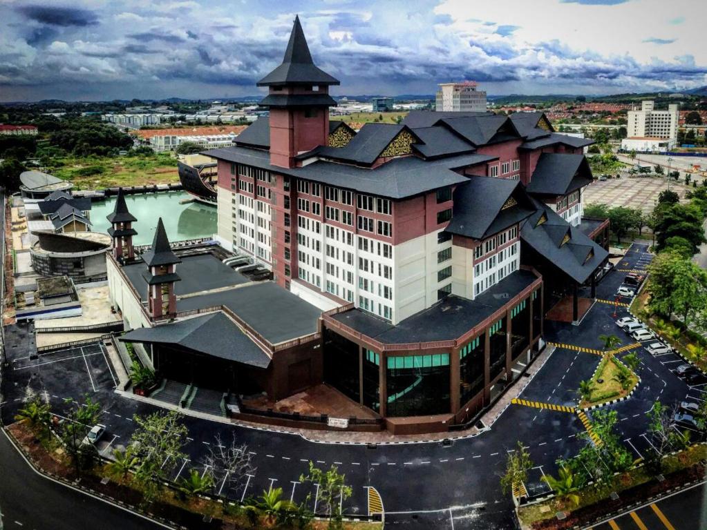 an overhead view of a building with a tower at Mudzaffar Hotel in Malacca