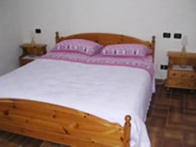 Postel nebo postele na pokoji v ubytování B&B Fattore