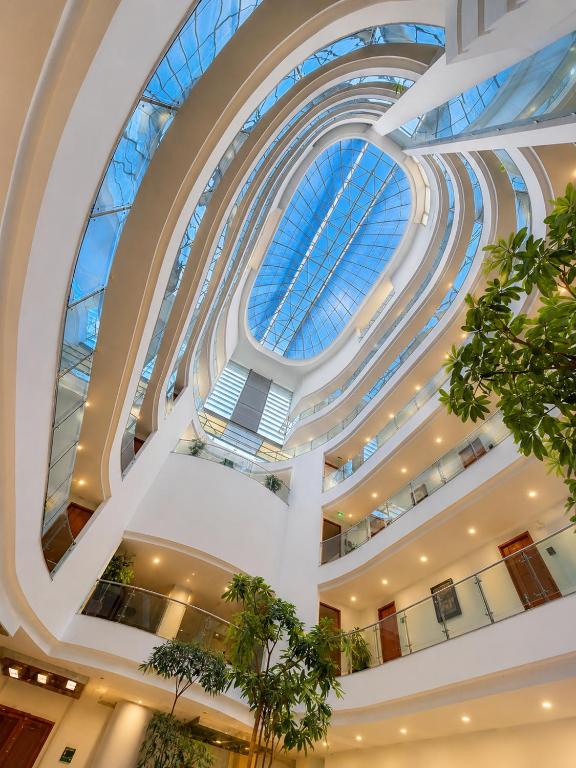 an image of a building with a glass ceiling at Hotel Atrium Plaza in Barranquilla