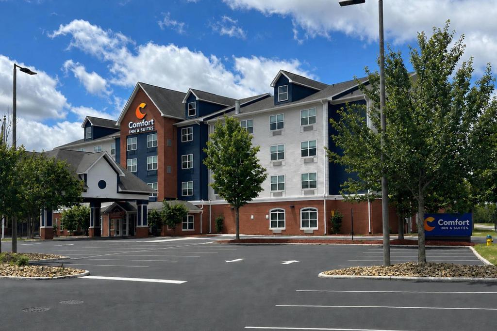 an empty parking lot in front of a hotel at Comfort Inn & Suites Concord - Kannapolis in Concord