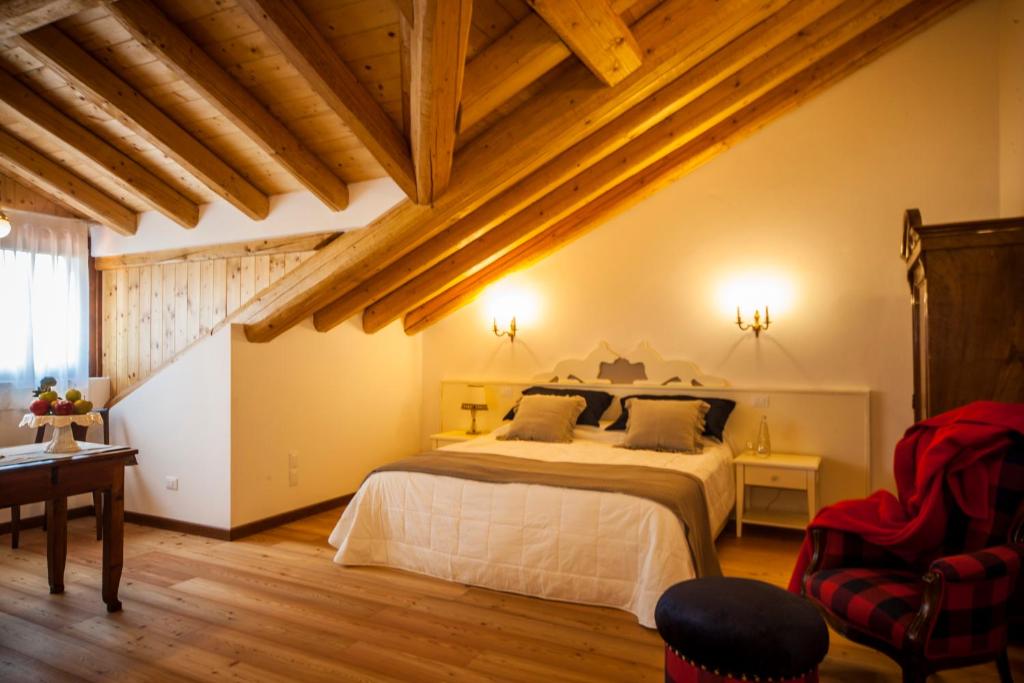 Postel nebo postele na pokoji v ubytování Agriturismo Le Volpi