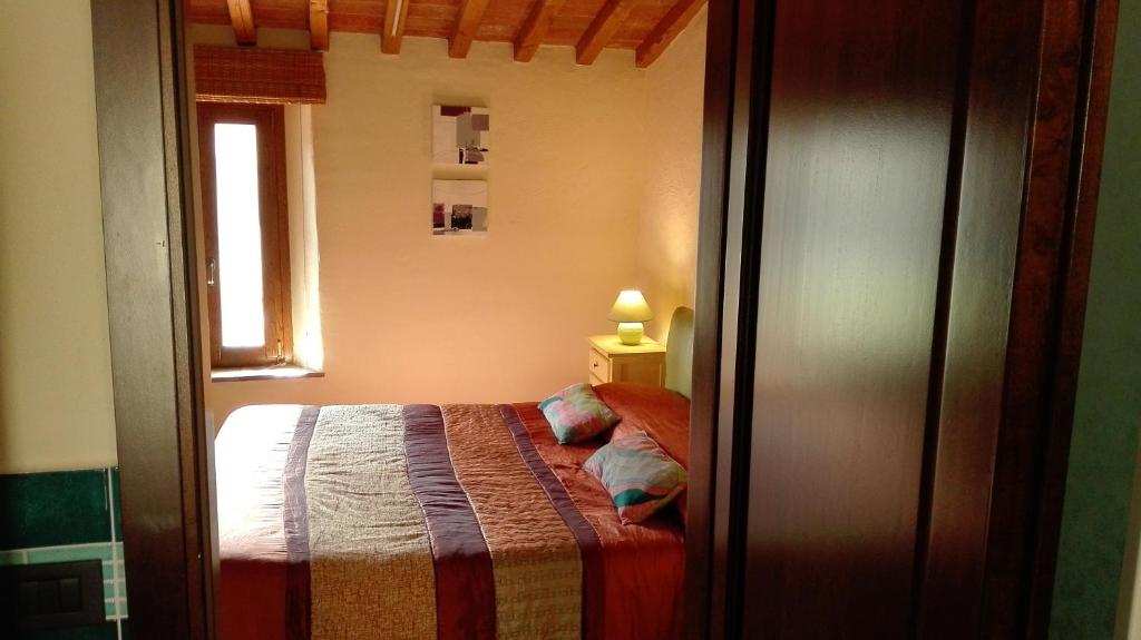 Łóżko lub łóżka w pokoju w obiekcie Thalassa Locanda B&B e appartamento