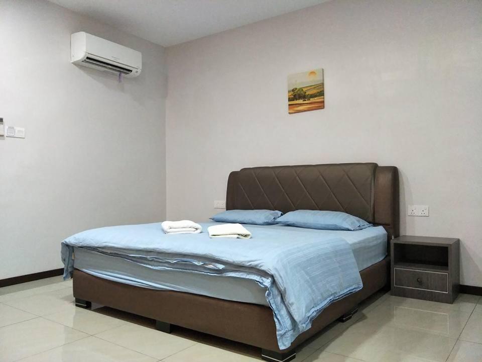Postel nebo postele na pokoji v ubytování Lim Mini Hotel