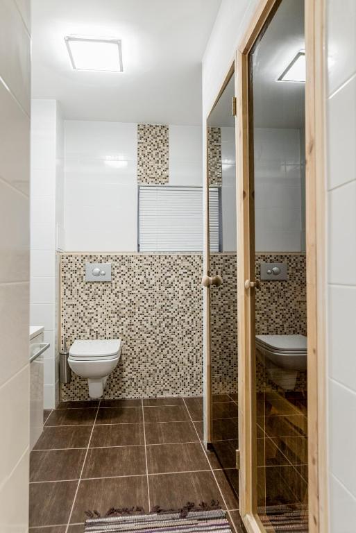 Koupelna v ubytování Marja Apartment