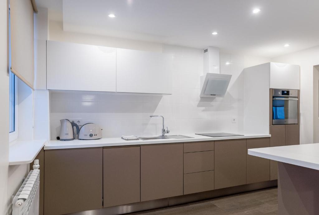 Kuchyň nebo kuchyňský kout v ubytování Marja Apartment