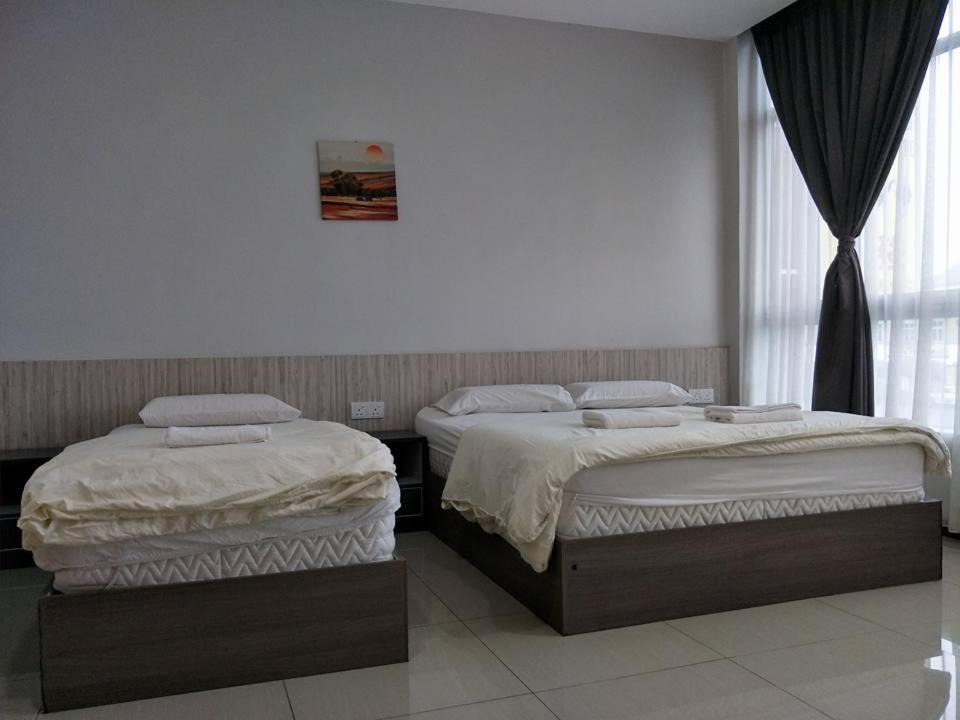 Postel nebo postele na pokoji v ubytování Lim Mini Hotel