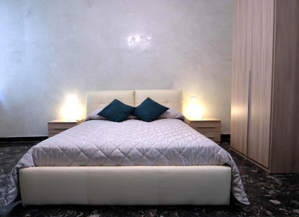 A bed or beds in a room at Residence Stendhal Guest House